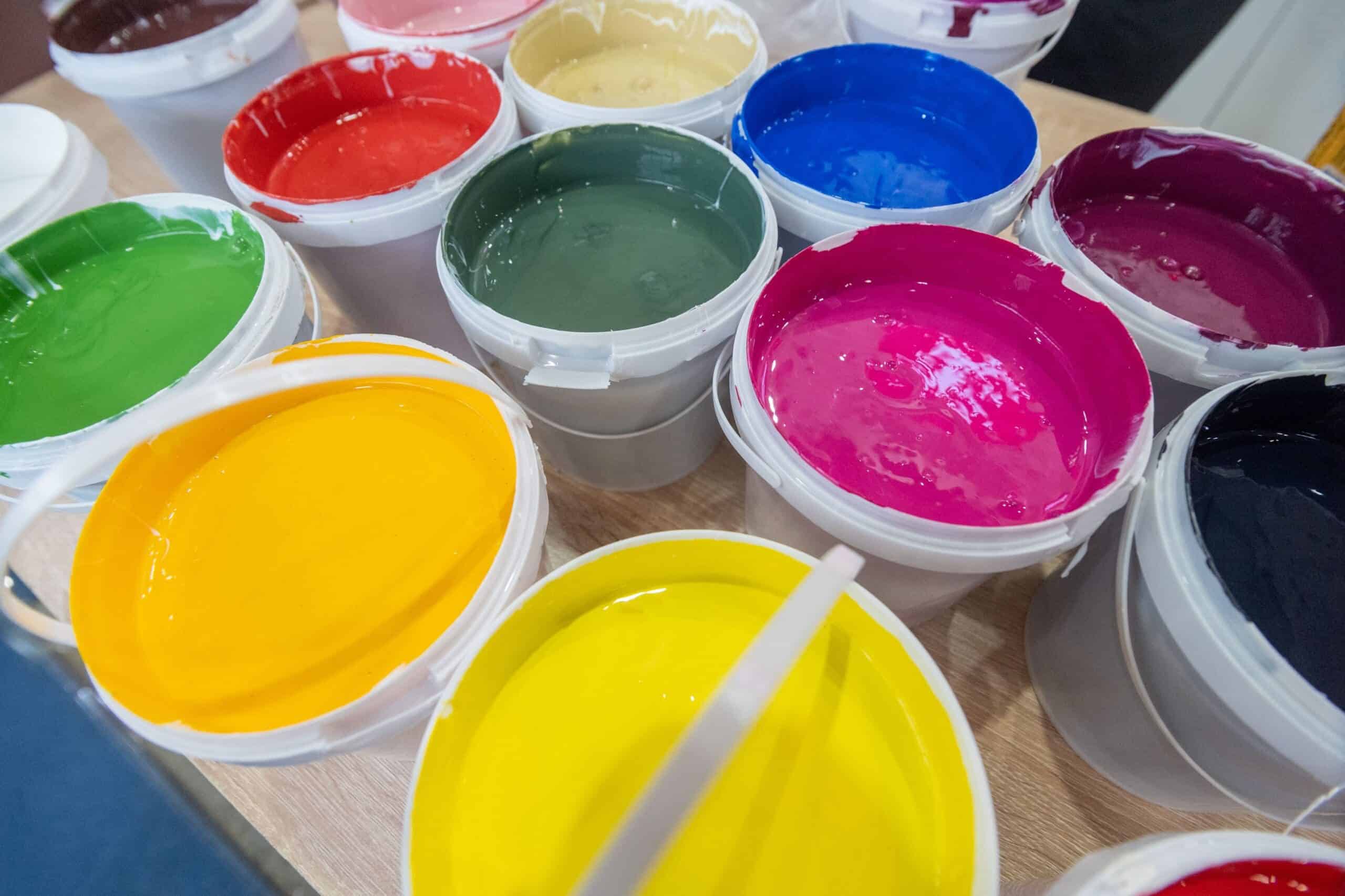 Closeup Shot Of Buckets Of Colorful Paint In A Medical Manufacturing Pharmaceutical Warehouse